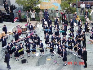 Student band on dock during ship departure